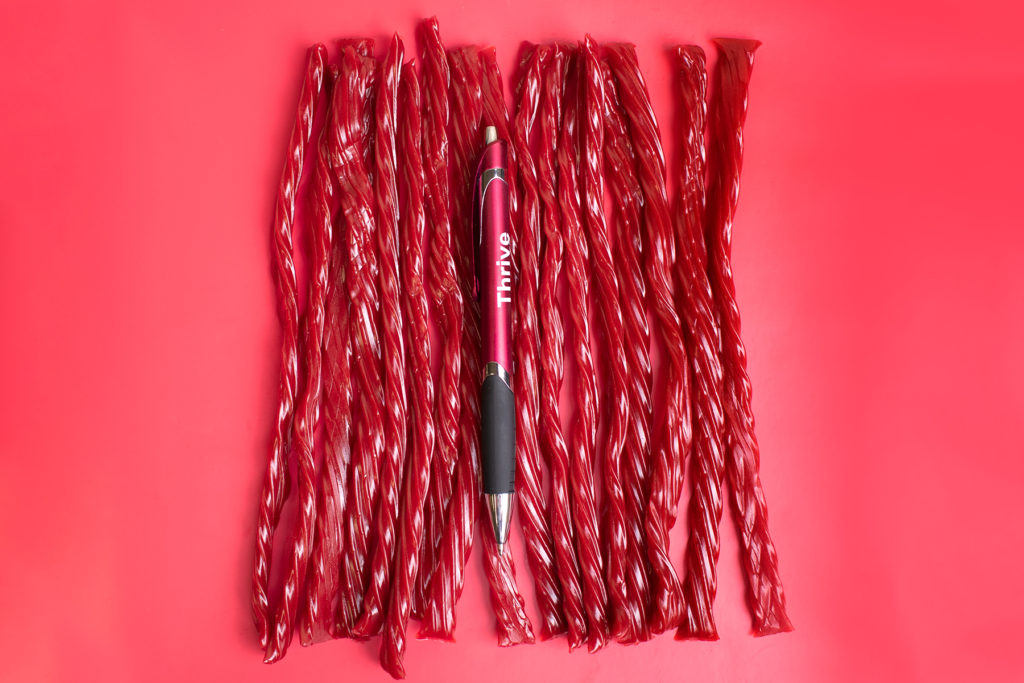 Martinett red promotional pen on Twizzlers