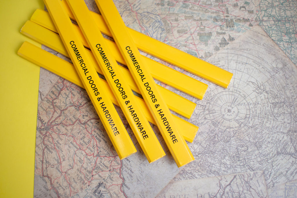 Yellow Carpenter promotional pencil with a travel theme