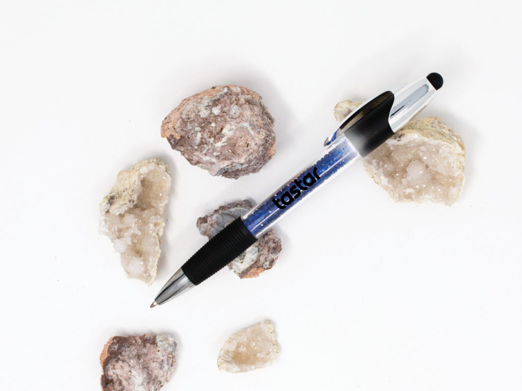 Geode Illuminated pen among white rocks